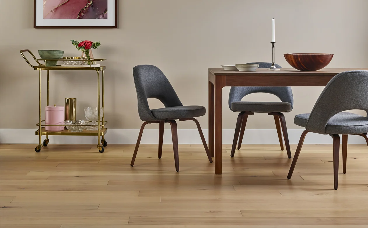 Casual kitchen with hardwood narrow light plank, black chairs